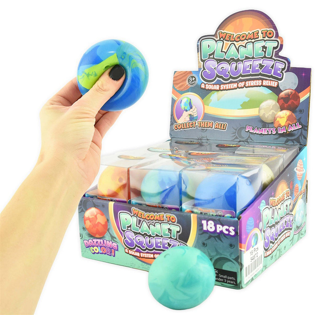 Blå squeeze ball med glitter fra Robetoy, på bord.