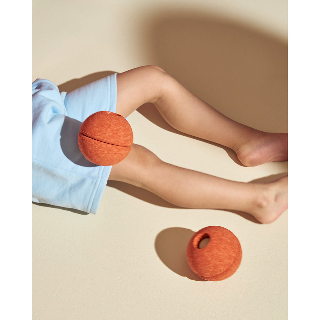 Modu skumbold, Burnt orange / Dusty green