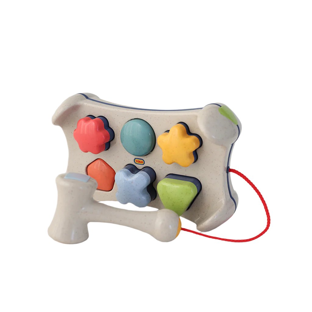 Tolo, hammerbrett og puttekasse i ett