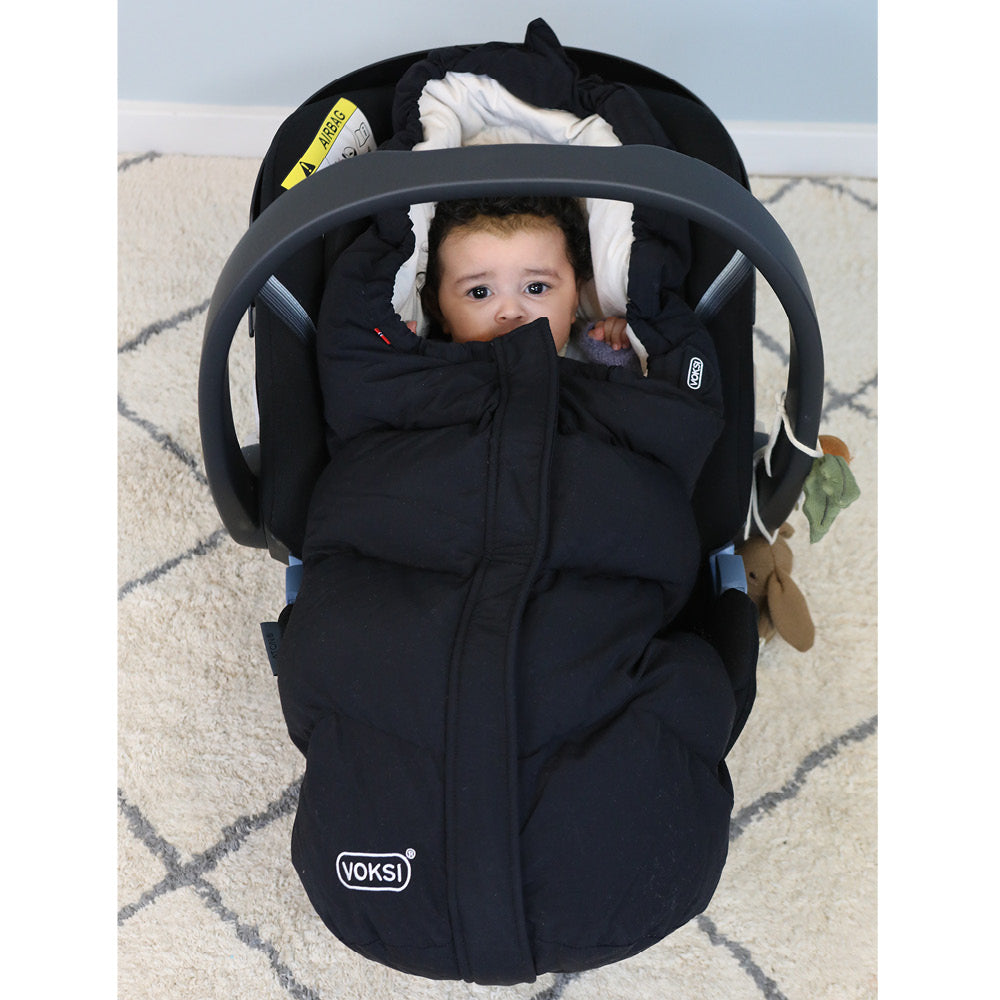 Voksi Move Black-Cream autostolpose med baby i bilstol