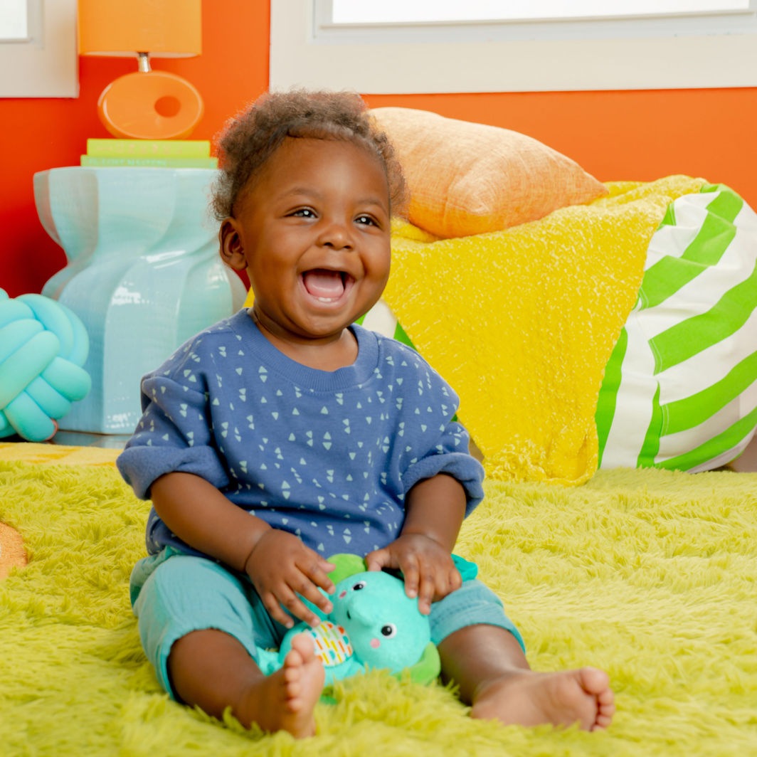 Bright Starts Aktivitetsoppheng med lys og lyd, Tug Tunes™ - Elefant