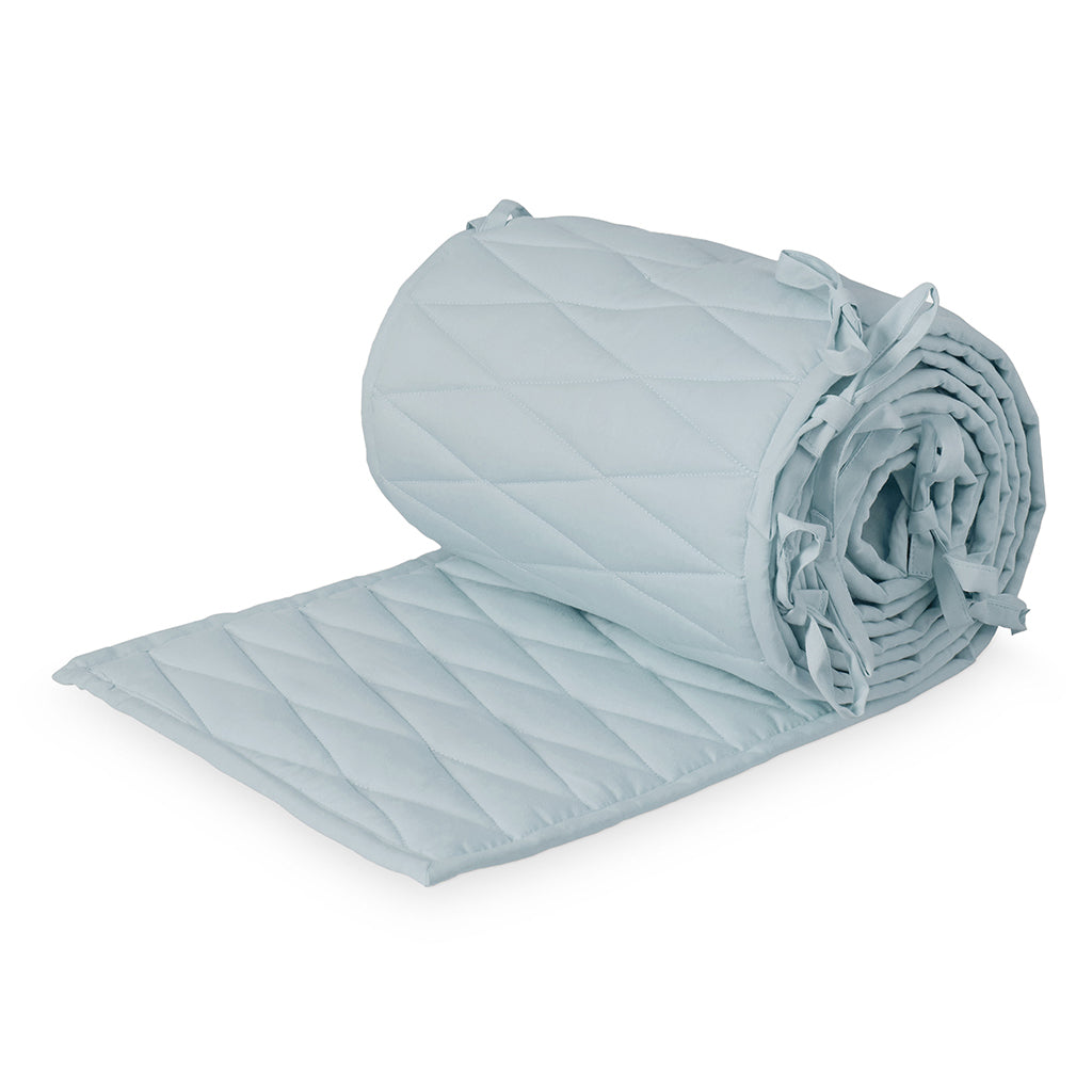 Cam Cam sengerand i Florentine Blue farve rullet sammen
