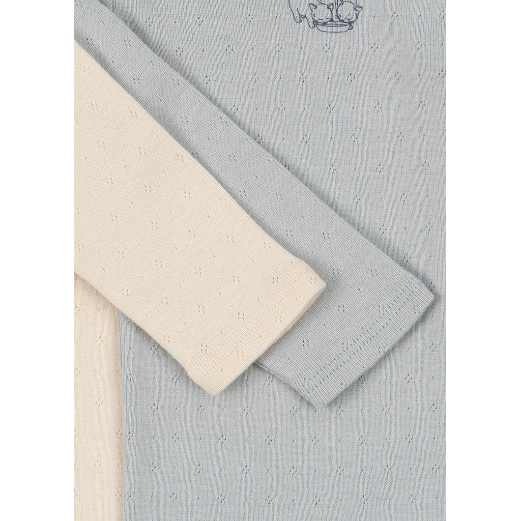 Fanga Fontana Perla bodystocking med lange ermer, 2-pak – Buttercream/Pearl blue – str. 0–9 mnd.