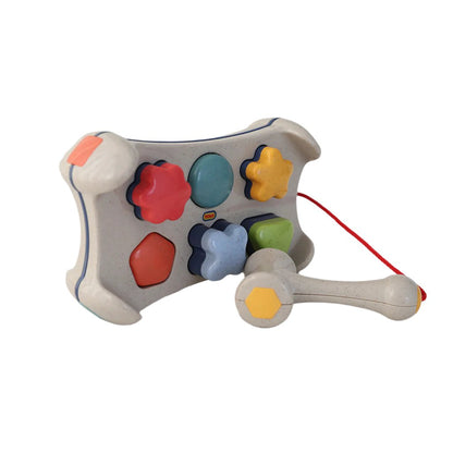 Tolo, hammerbrett og puttekasse i ett