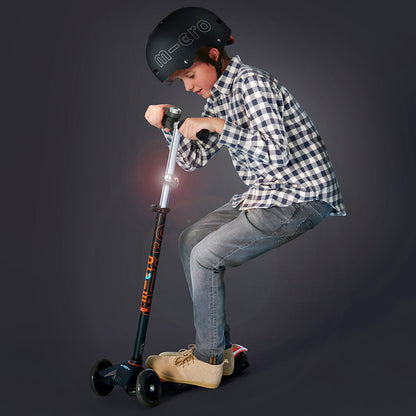 Micro Løbehjul Lys Deluxe, sort silikone lygte på scooter